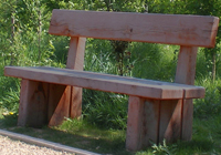 A smooth dressed wooden outdoor garden furniture seat